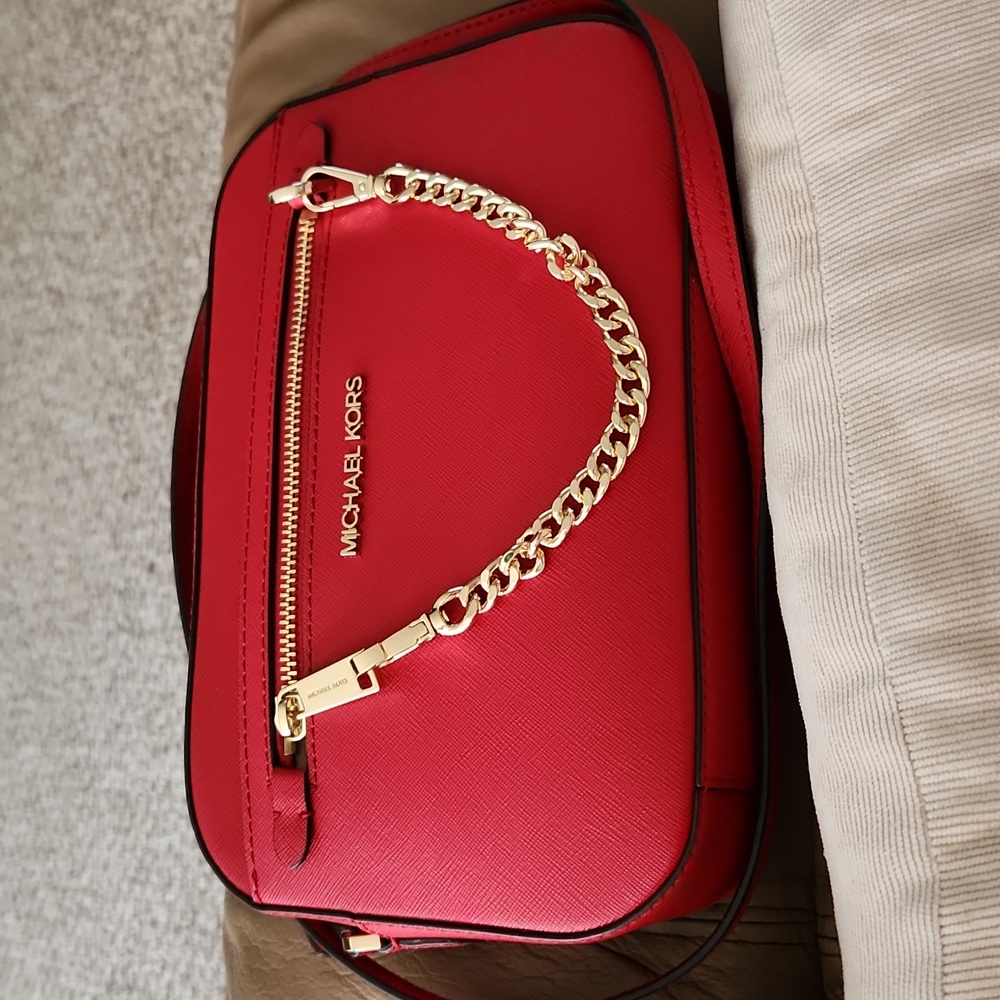 Michael kors jet set handbag.new never used.